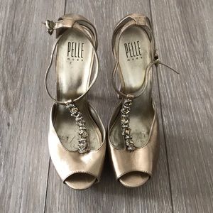 Italian made gold leather heels.